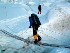 Alan crossing a crevasse in the Khumbu Icefall