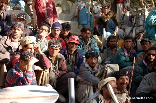 Porters in the Karakoram. Carrying gear to K2 Base Camp.
