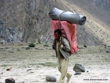 Porters in the Karakoram. Carrying gear to K2 Base Camp.