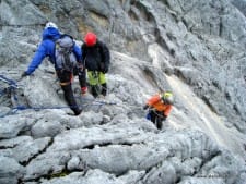Team Rapelling Down From Summit Ridge