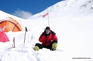 Alan posting dispatch using sat phone
