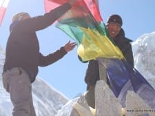 Sherpas putting up the prayer flags.