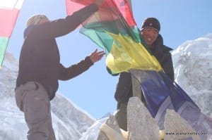 Sherpas putting up the prayer flags.