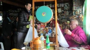 Garrett Madiosn with blessed prayer flags from Lama Geshi