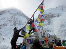 Raising Prayer Flags over Everest Base CampRaising Prayer Flags over Everest Base Camp