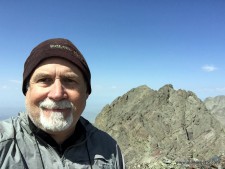 My obligatory selfie on the summit Crestone Needle with Crestone Peak in the background.