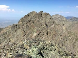 Looking back at Crestone Peak from Crestone Needle. You can see climbers on the summit.