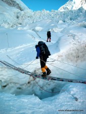 Alan crossing a crevasse in the Khumbu Icefall