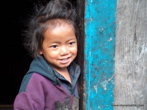 Love that hair! Young lady in the Khumbu,