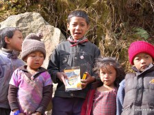 Passing out writing pens in the Khumbu.