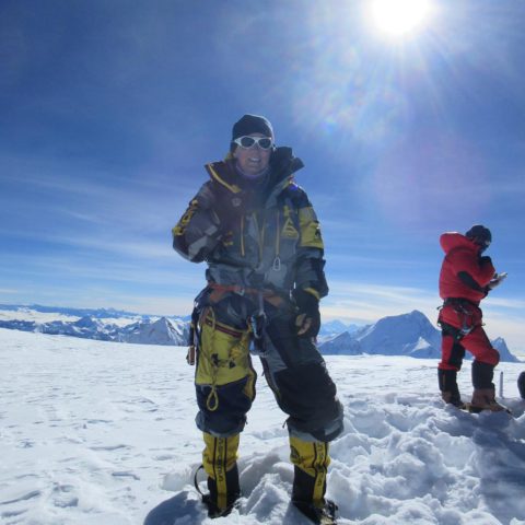 Tracee Metcalfe on Cho Oyu Summit with Everest behind