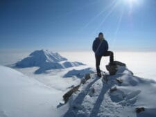 Alan at 17,200' Camp with Mt. Hunter behind on Denali