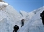 An Icefall Doctor carrying ladders up the Khumbu Icefall