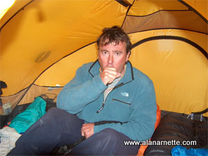 Nick coughing in his tent